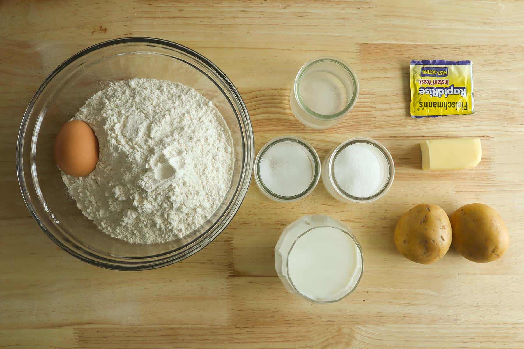ingredients needed to make potato bread rolls.