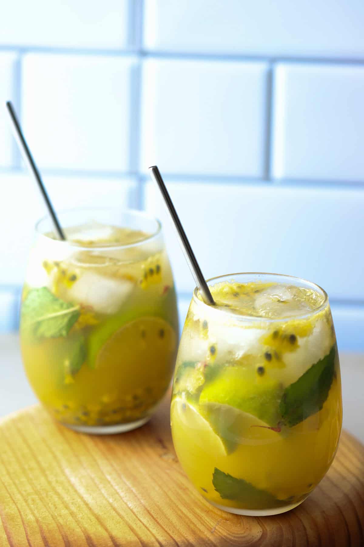 two passion fruit mojito cocktails.