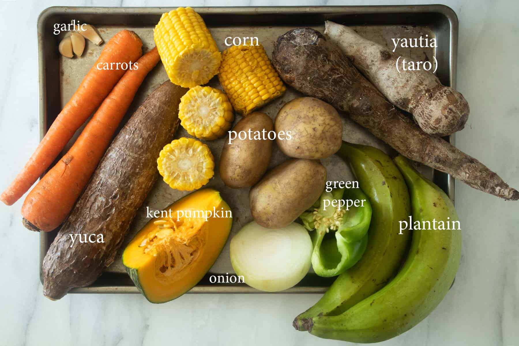 tray full of the vegetable ingredients needed to make sancocho.