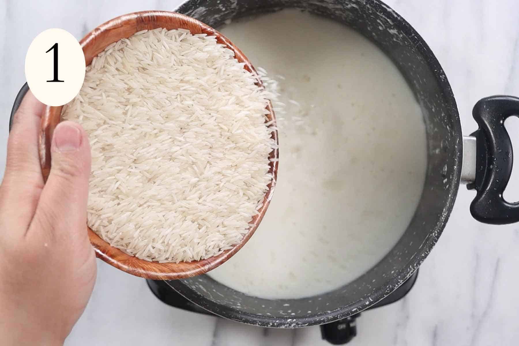 pouring basmati rice in a pan with coconut milk.