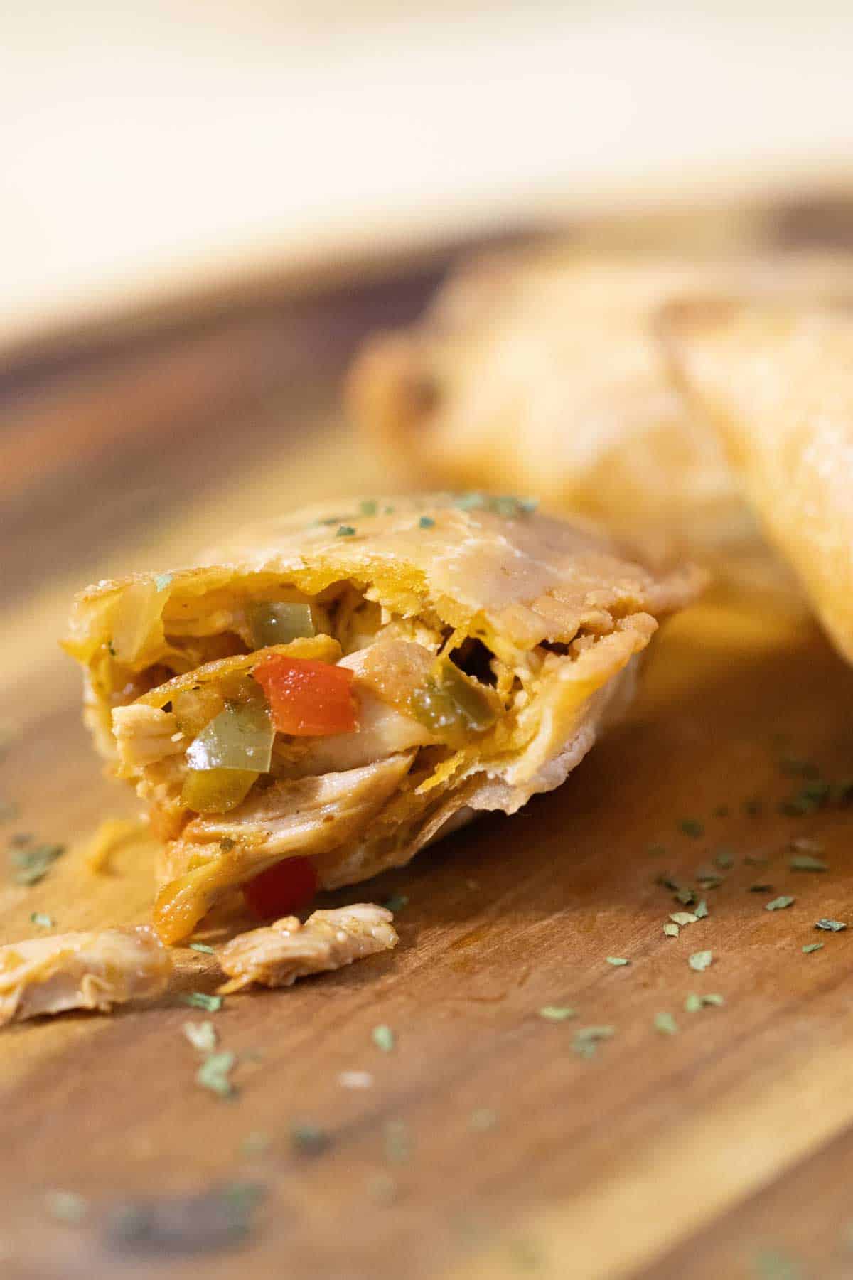 3 chicken empanadas and one split in half.