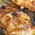 2 pieces of a puerto rican pechuga a la plancha or pan fried chicken breast.