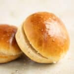 2 potato burger buns cut in half.