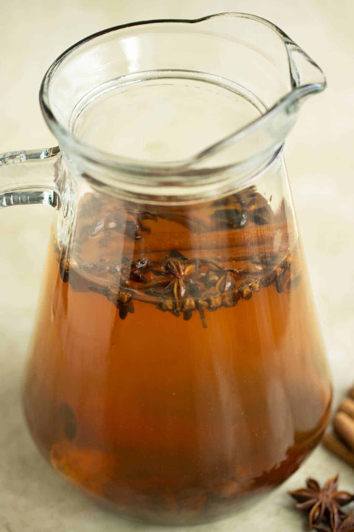 a big pitcher with coquito spice tea.