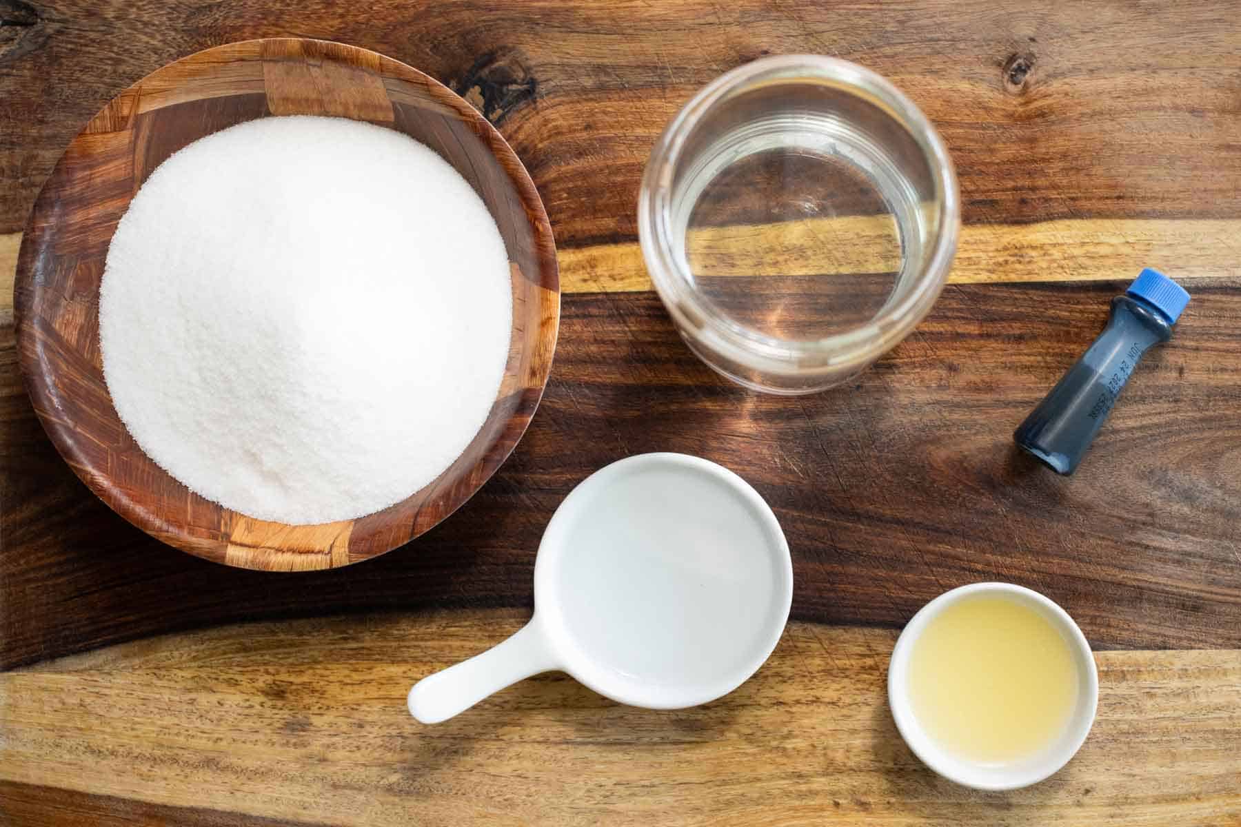 All the ingredients needed to make a Puerto Rican limber de pitufo or blueberry frozen cup.
