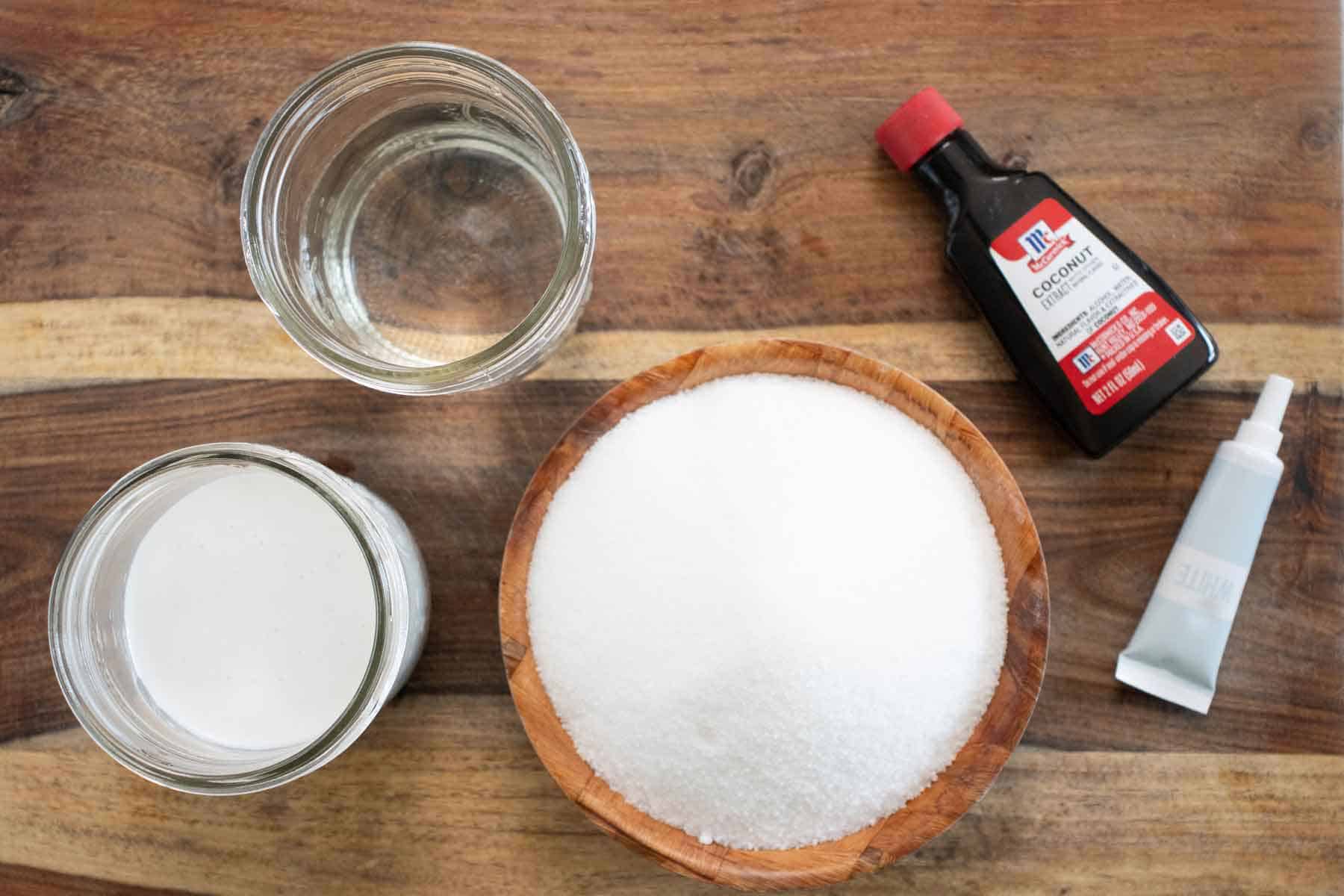 All the ingredients needed to make a piragua de coco or coconut shaved ice.