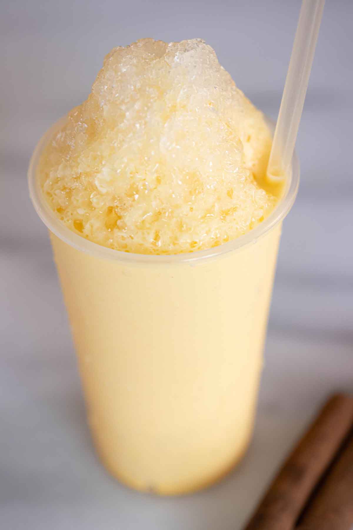 A Puerto Rican piragua de crema or vanilla flavor shaved ice.