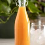 A bottle of homemade ice cream flavor syrup used for puerto rican piraguas and limbers.