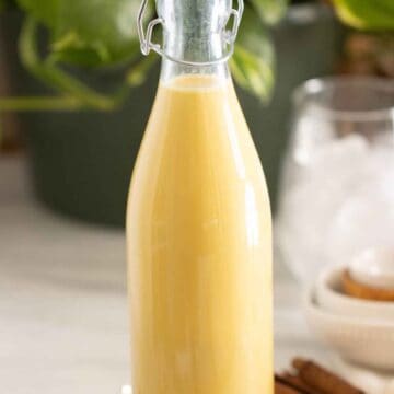 A bottle of homemade vanilla syrup de crema used for drinks, cocktails, and desserts.