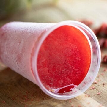 A cup of a strawberry flavor Puerto Rican limber.