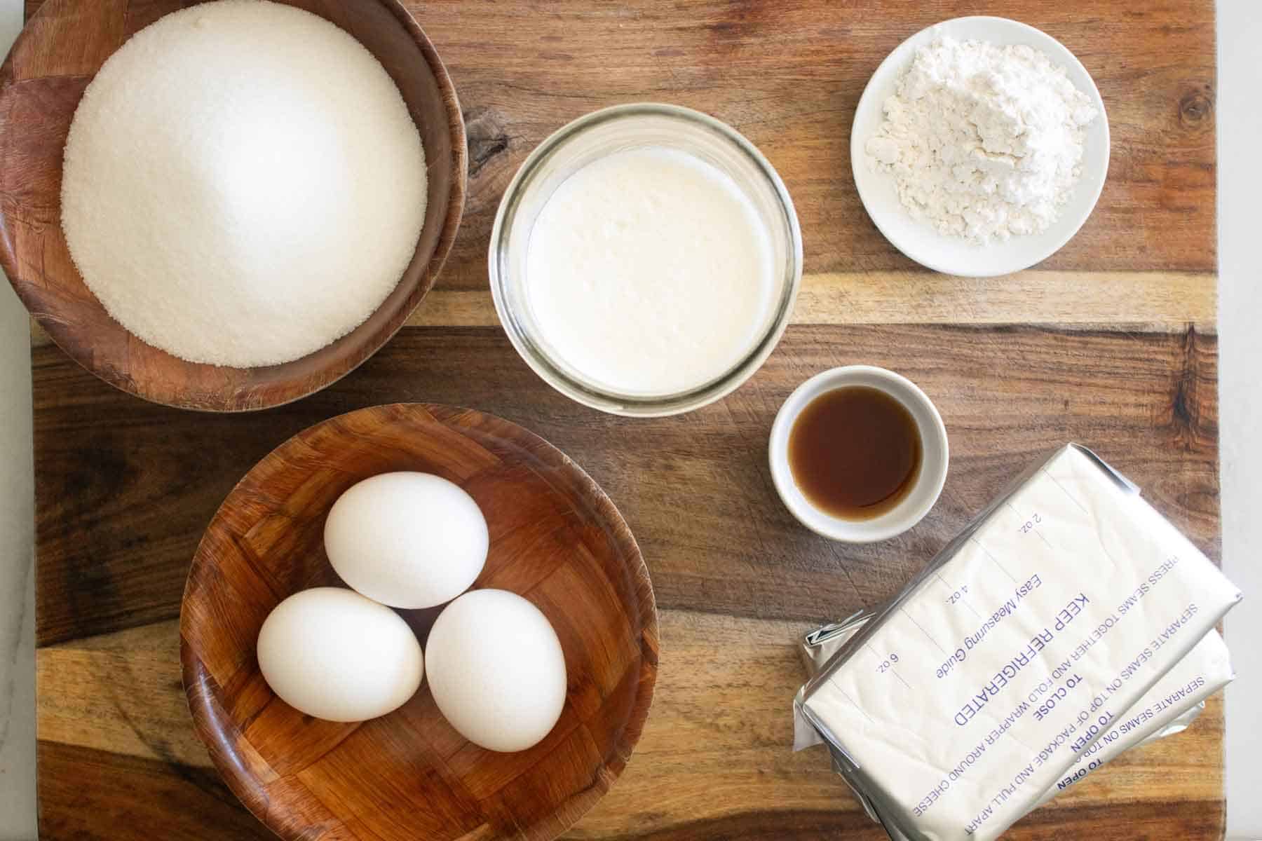 All the ingredients needed to make a basque cheesecake.