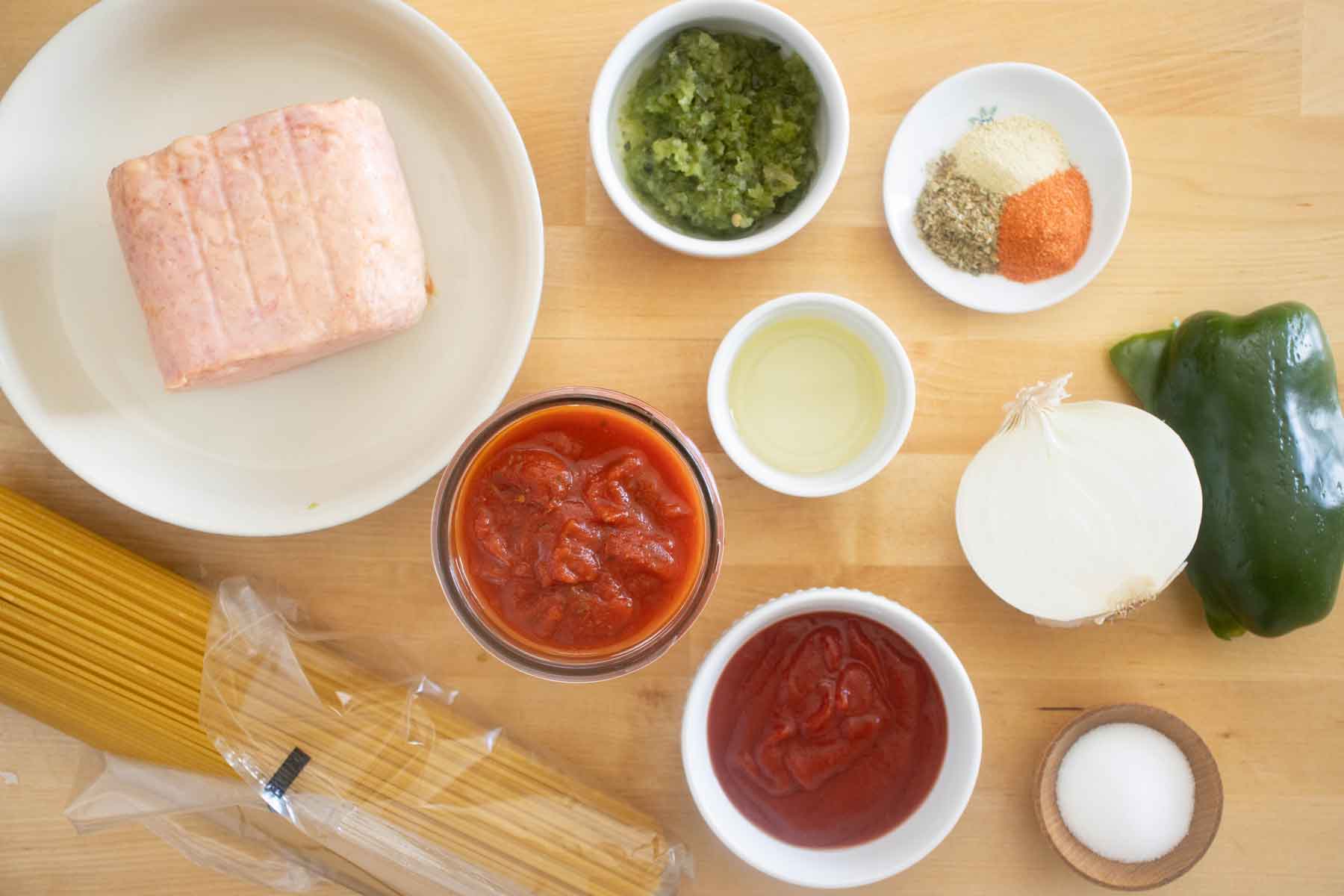 All the ingredients needed to make spam with spaghetti in a Puerto Rican style.