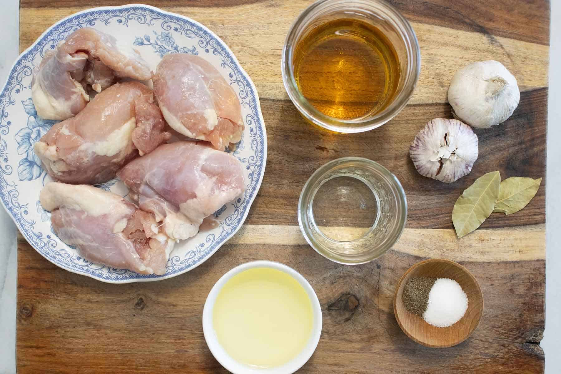 All the ingredients needed to make a spanish garlic chicken.