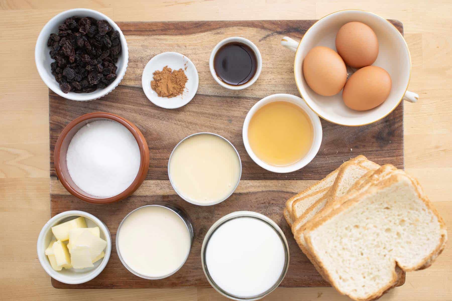All the ingredients needed to make a bread pudding with caramel.
