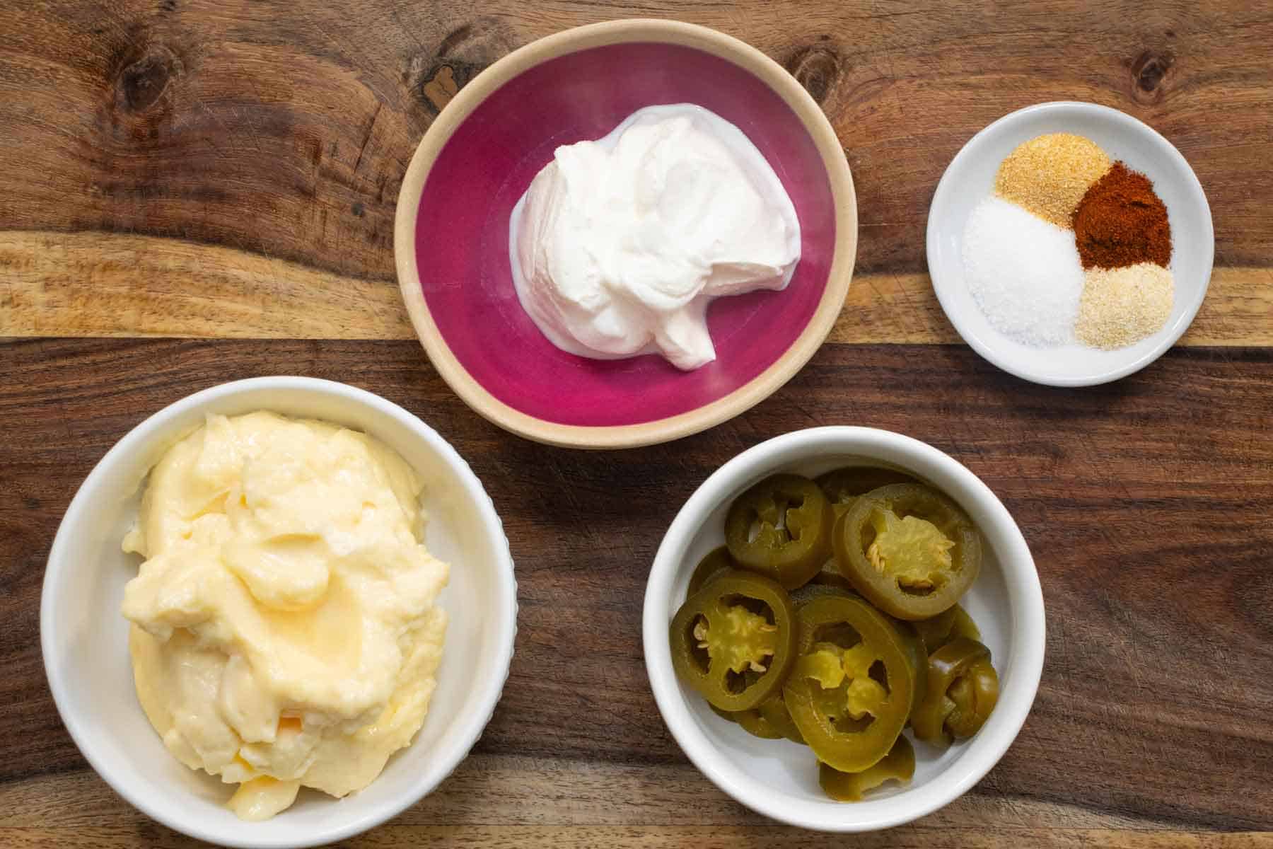 All the ingredients needed to make a creamy jalapeno sauce.