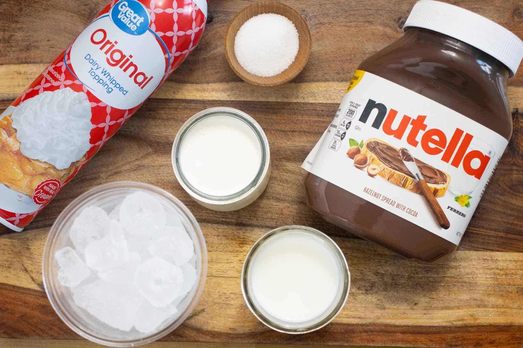 All the ingredients needed to make a nutella frappe.